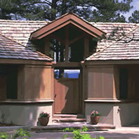 Redwood tongue and groove siding clads a contemporary house.